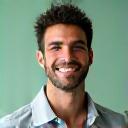 Retrato de Luís Santos, profissional de TI sorrindo.